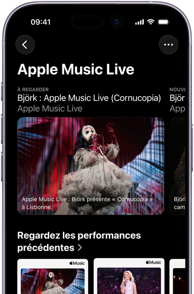 Apple Music Live sur l’écran d’iPhone, affichant les catégories À regarder et Performances précédentes, ainsi que des contenus exclusifs comme Apple Music : Les 100 meilleurs albums