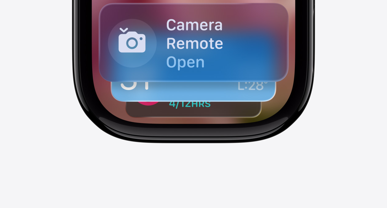 Apple Watch in Jet Black with no strap, face shows Smart Stack hint indicator