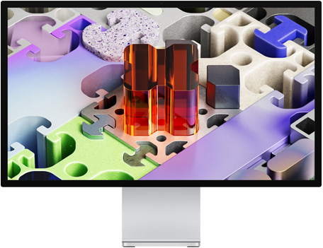 A Studio Display XDR elölnézete egy háromdimenziós kirakószerű háttérképpel