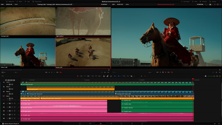 Studio Display og Mac Studio med en arbeidsflyt for redigering av flerkameravideo i DaVinci Resolve Studio